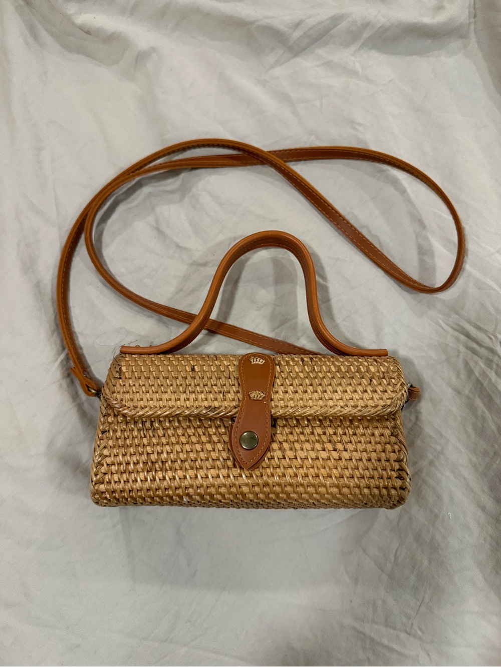 Woven Ratan Crossbody Bag with Tan Leather Trim and top handle